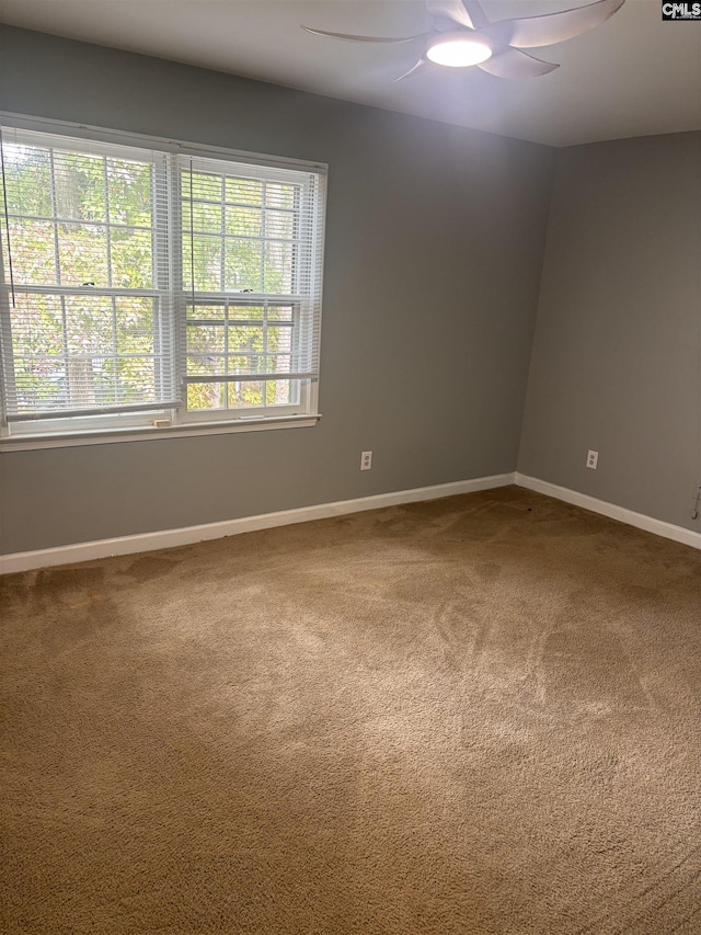 7602 Hunt Club Rd Unit I102, Columbia, SC 29223 - spare room with carpet flooring, a ceiling fan, and baseboards