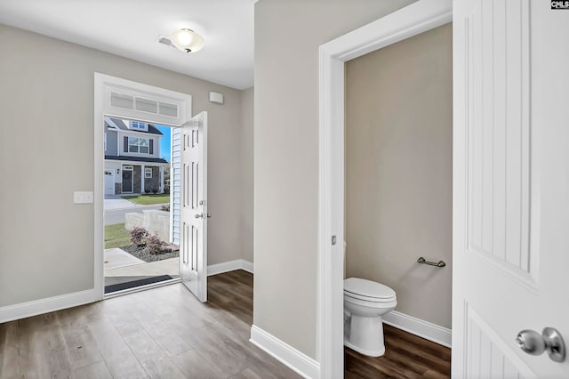 foyer with wood-type flooring