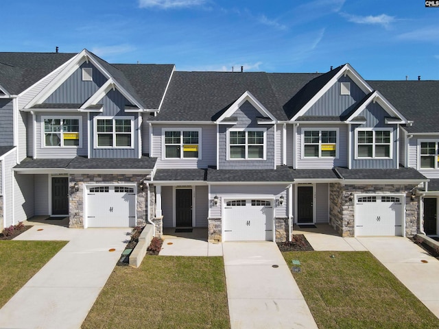 view of front facade with a front lawn and a garage