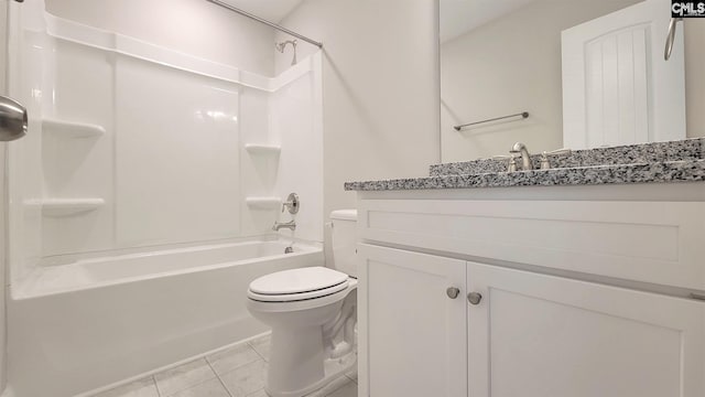 full bathroom featuring toilet, vanity, tile patterned floors, and shower / bathtub combination