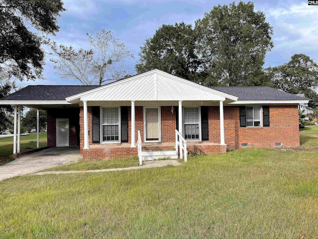 ranch-style home with a carport, a front yard, and covered porch