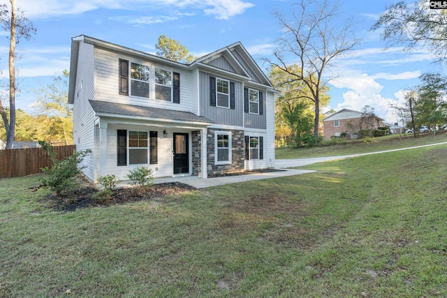 view of front of home with a front yard