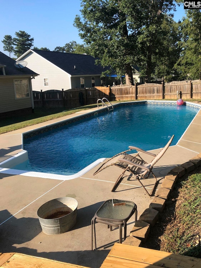 view of pool with a patio