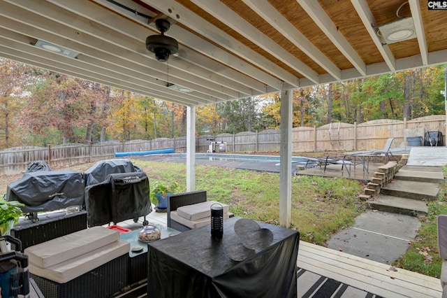 view of patio featuring area for grilling and a swimming pool side deck