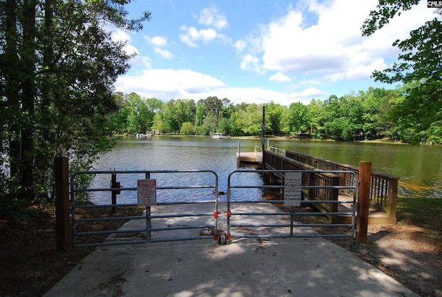 dock area featuring a water view