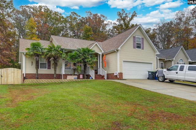 view of front of house with a front lawn, a porch, and a garage