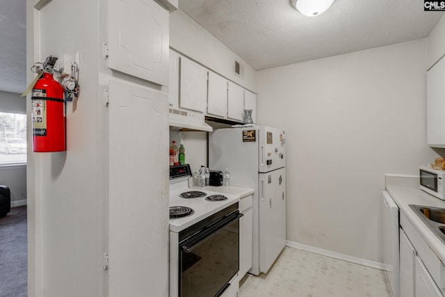 kitchen with white cabinets, ventilation hood, white appliances, and a textured ceiling