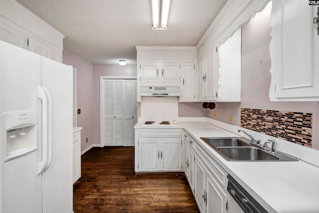 kitchen with white cabinetry, white fridge with ice dispenser, sink, dark hardwood / wood-style floors, and exhaust hood