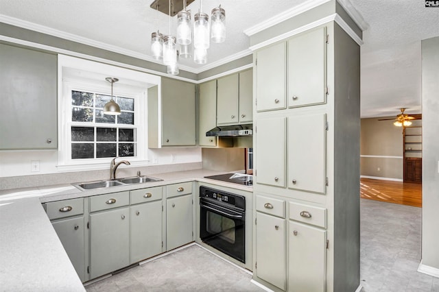 kitchen featuring black appliances, sink, hanging light fixtures, ceiling fan, and ornamental molding