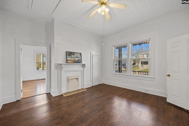 unfurnished living room with dark hardwood / wood-style flooring, ceiling fan, and ornamental molding