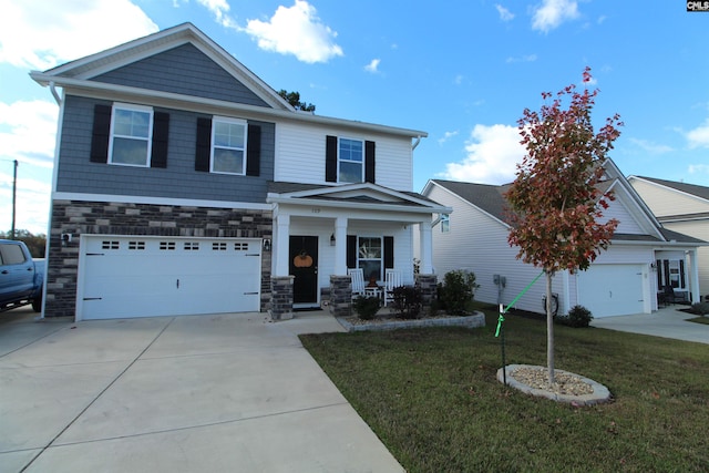 view of front facade featuring a porch, a garage, and a front lawn