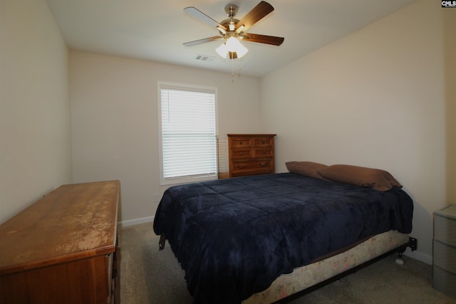 bedroom with ceiling fan and carpet floors