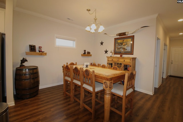 dining area with dark hardwood / wood-style flooring, a chandelier, and ornamental molding