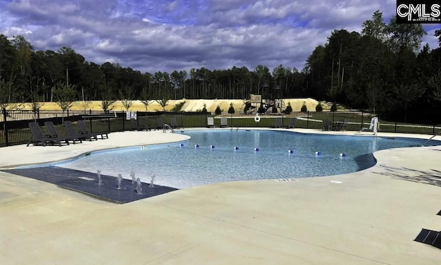 view of pool with a patio