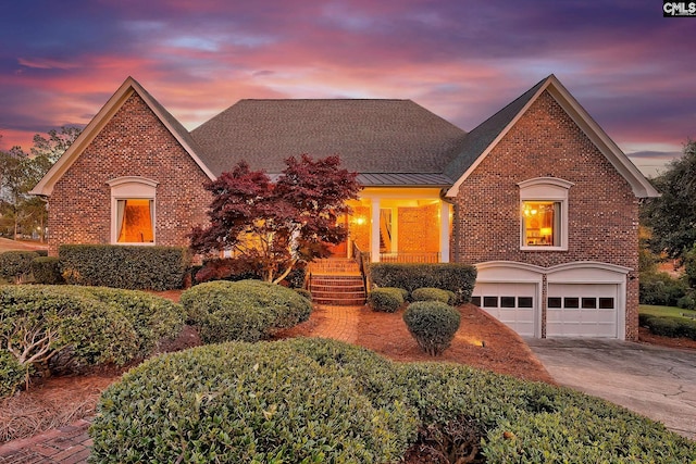 view of front of home with a garage