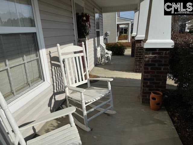 view of patio featuring a porch