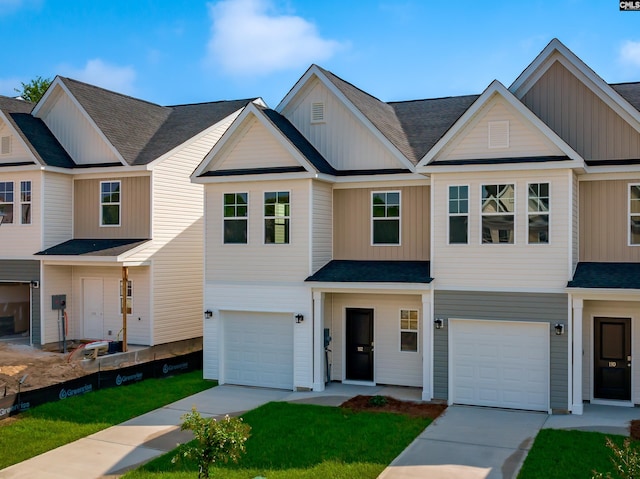 townhome / multi-family property featuring a garage