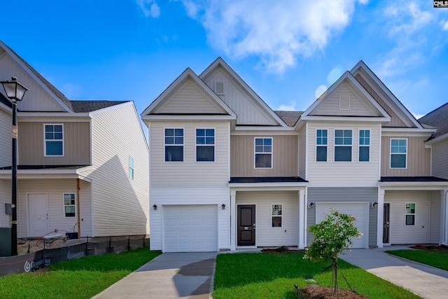 multi unit property featuring a garage