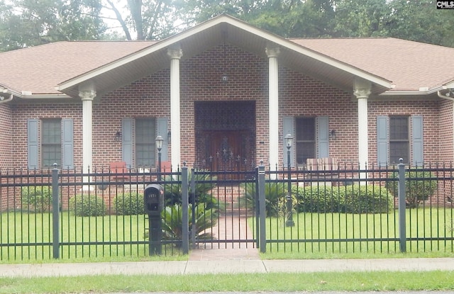 view of side of property featuring a yard