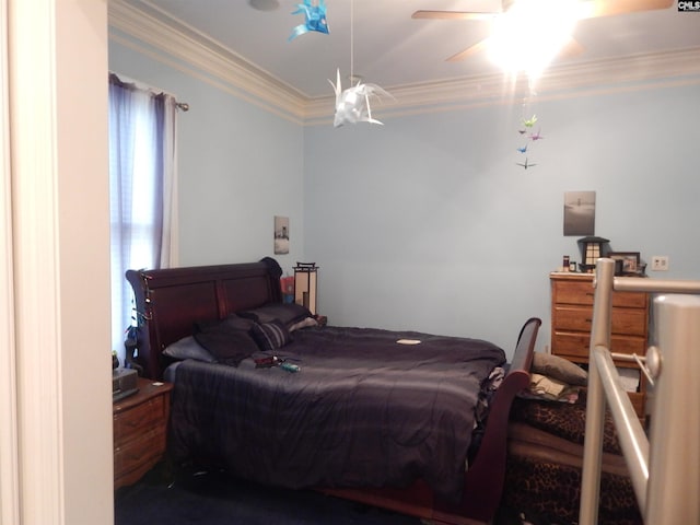 bedroom with ceiling fan and crown molding