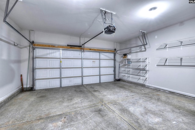 garage featuring a garage door opener