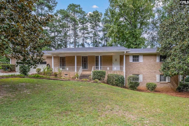 view of front of property with covered porch and a front lawn