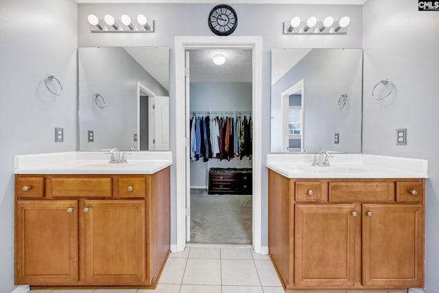 bathroom featuring tile patterned floors and vanity