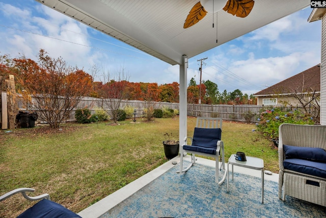 view of yard featuring ceiling fan