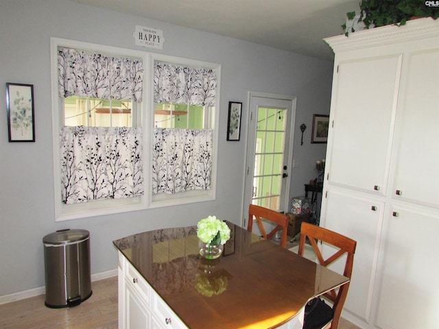 dining space featuring light hardwood / wood-style flooring