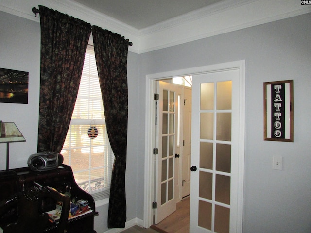 office with french doors, wood-type flooring, and ornamental molding