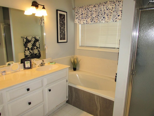 bathroom with separate shower and tub, tile patterned flooring, and vanity