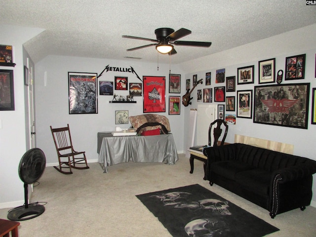 interior space with ceiling fan and a textured ceiling