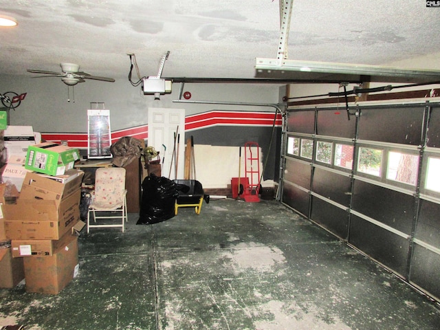 garage featuring a garage door opener and ceiling fan