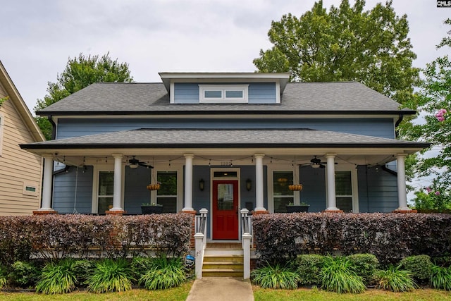 view of front of home featuring ceiling fan and a porch