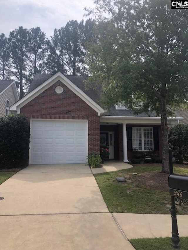 ranch-style house with a garage and a front lawn