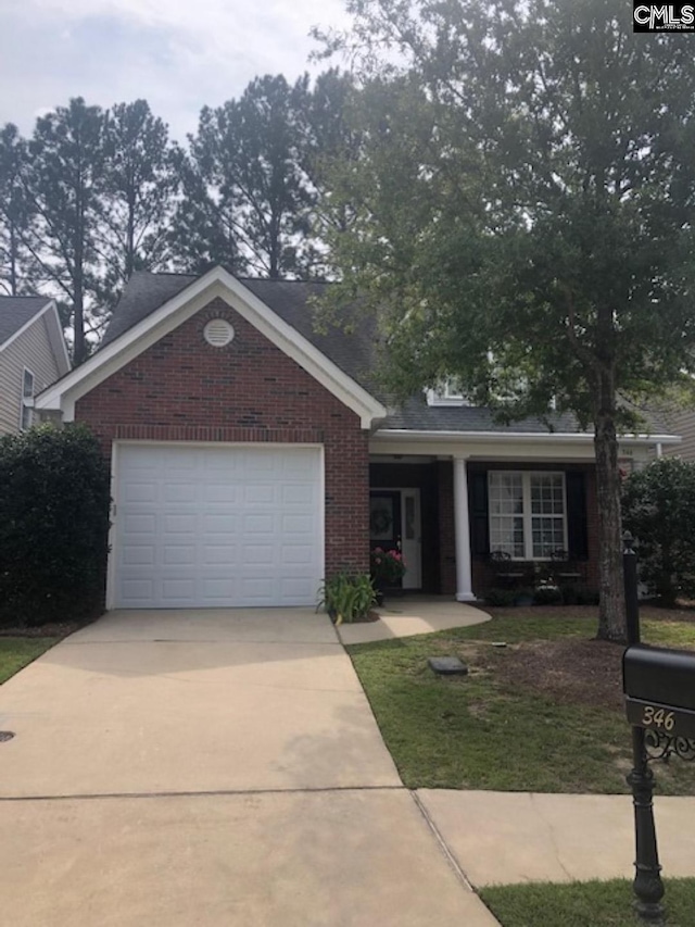 346 Arbor Oaks Ln, Irmo, SC 29063 - ranch-style house with concrete driveway, brick siding, a porch, and an attached garage