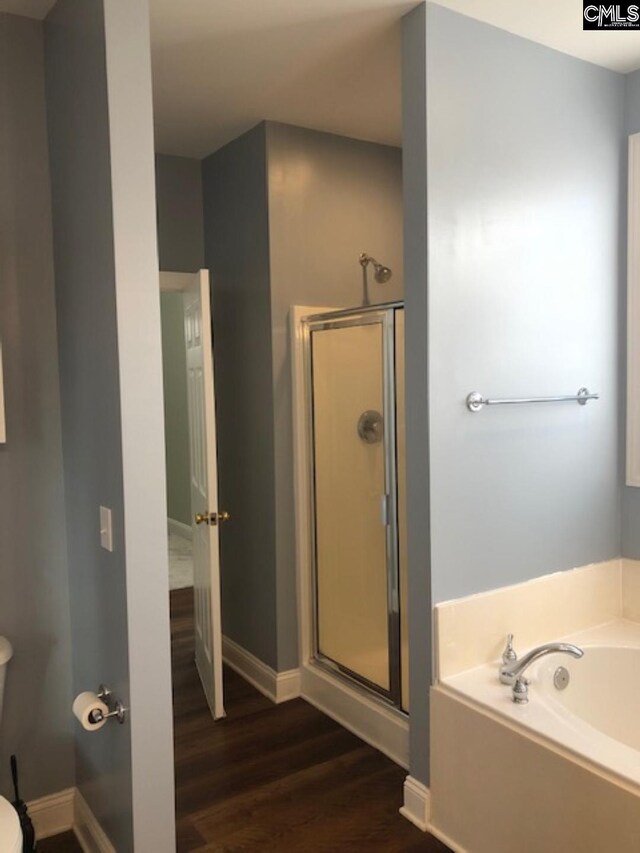 346 Arbor Oaks Ln, Irmo, SC 29063 - full bath with a bath, a stall shower, wood finished floors, and baseboards