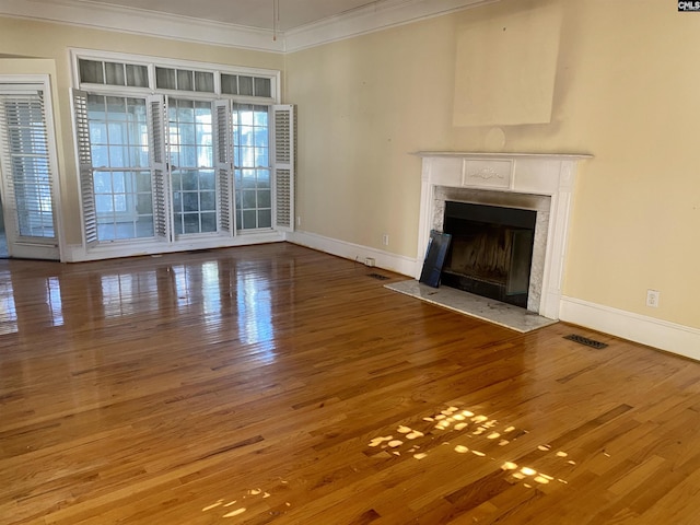 105 Overbranch Dr, Columbia, SC 29223 - unfurnished living room featuring ornamental molding, baseboards, a premium fireplace, and wood finished floors