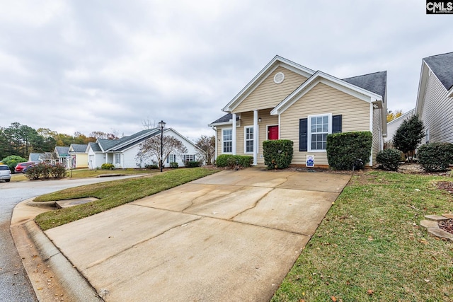 view of front of home with a front yard