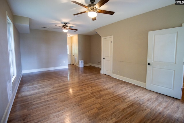 spare room featuring ceiling fan and wood-type flooring