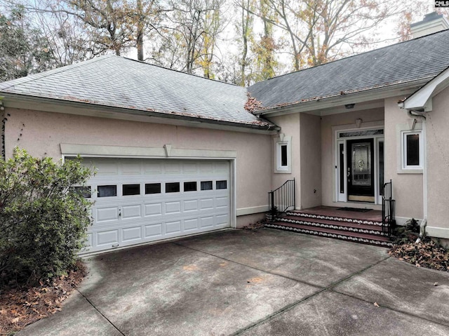 exterior space with a garage