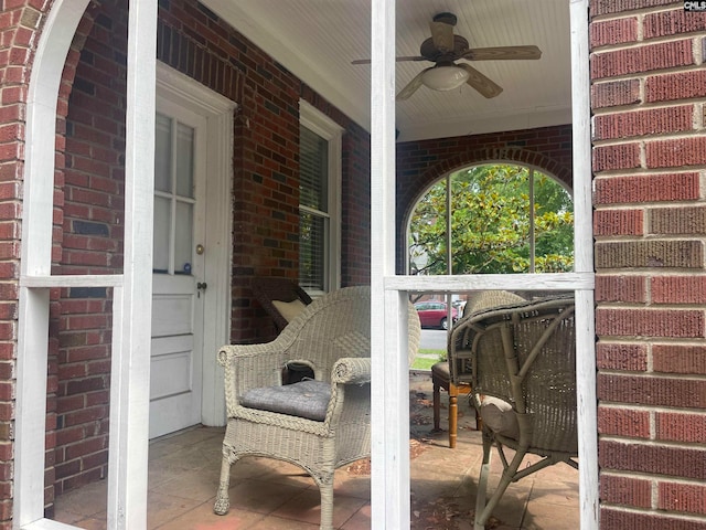 view of patio / terrace featuring ceiling fan and a porch