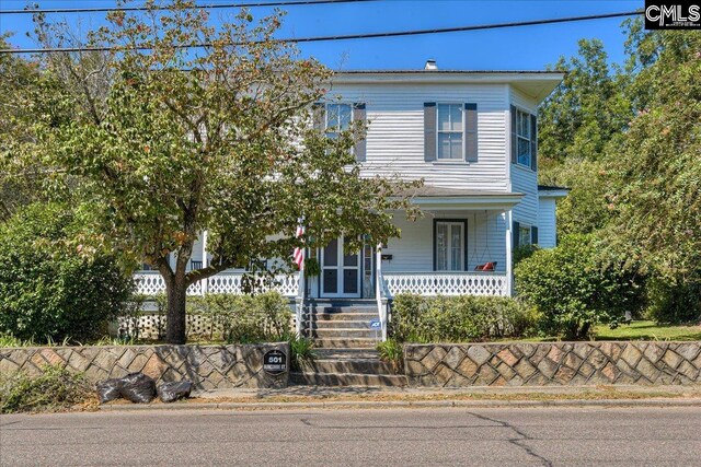 view of front facade featuring covered porch