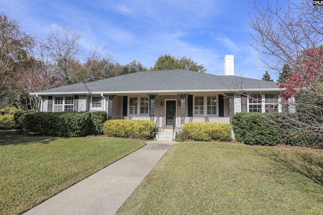 single story home featuring a front lawn and covered porch