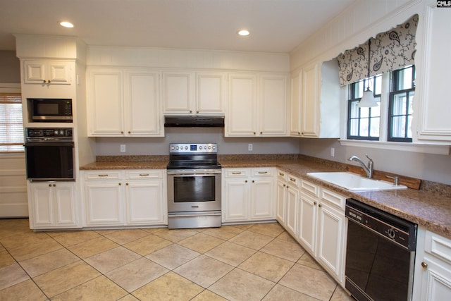 kitchen with black appliances, white cabinetry, sink, and light tile patterned floors