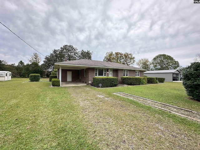 ranch-style house with a front lawn and a carport