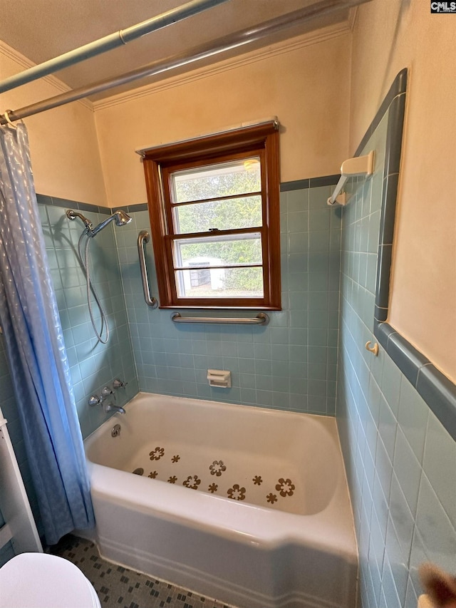 bathroom with tile patterned flooring, toilet, shower / bathtub combination with curtain, and ornamental molding