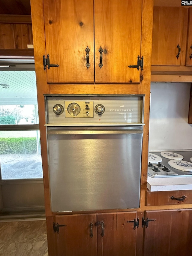 interior details featuring oven and white stovetop