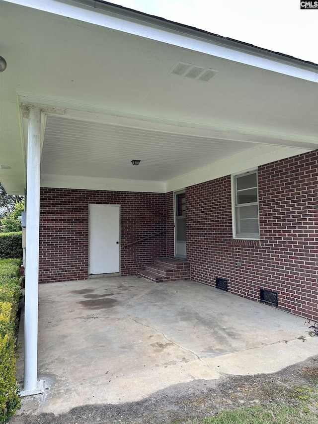 view of patio with a carport