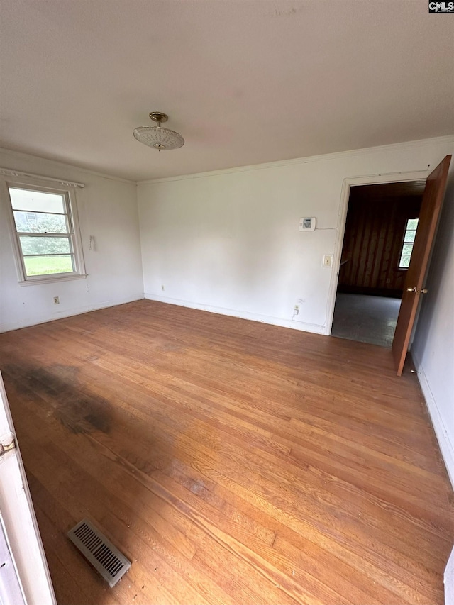 spare room with light wood-type flooring